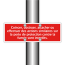 Coincer, obstruer, attacher ou effectuer des actions similaires sur la porte de protection contre la fumée sont interdits.