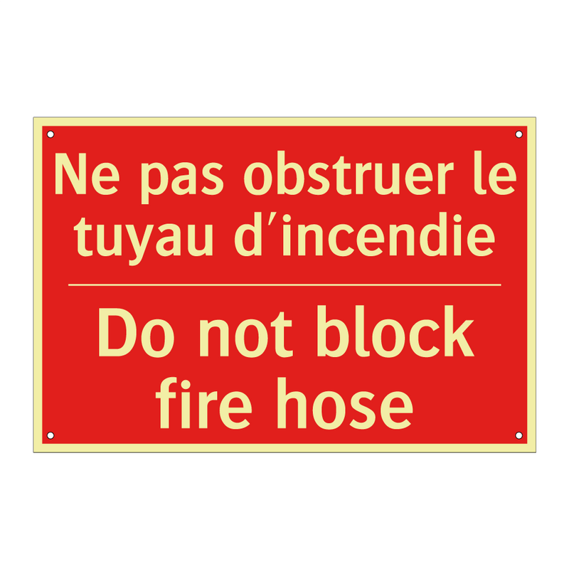 Ne pas obstruer le tuyau d'incendie /.../ - Do not block fire hose