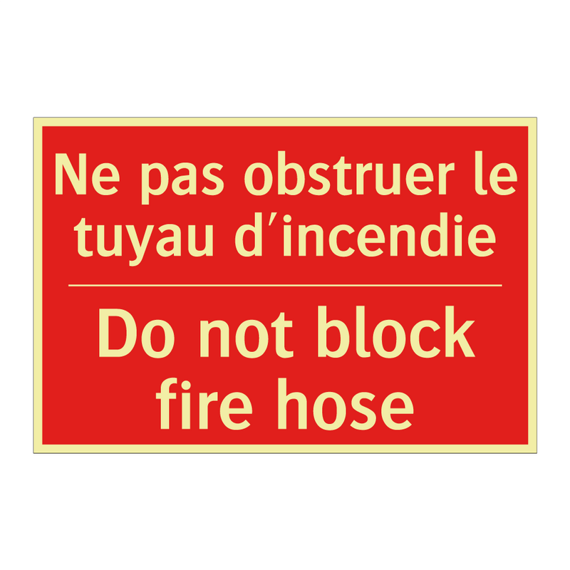 Ne pas obstruer le tuyau d'incendie /.../ - Do not block fire hose