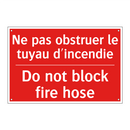 Ne pas obstruer le tuyau d'incendie /.../ - Do not block fire hose