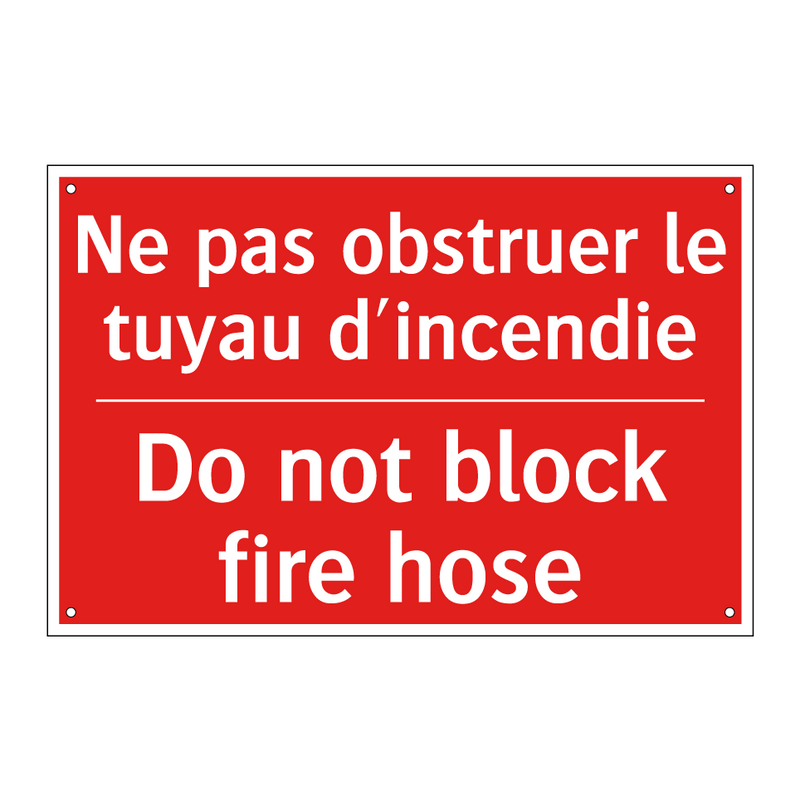 Ne pas obstruer le tuyau d'incendie /.../ - Do not block fire hose