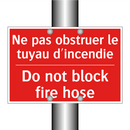Ne pas obstruer le tuyau d'incendie /.../ - Do not block fire hose