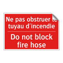 Ne pas obstruer le tuyau d'incendie /.../ - Do not block fire hose