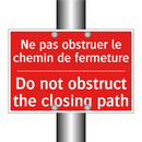 Ne pas obstruer le chemin de fermeture /.../ - Do not obstruct the closing path /.../