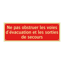 Ne pas obstruer les voies d'évacuation et les sorties de secours