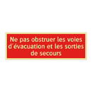Ne pas obstruer les voies d'évacuation et les sorties de secours