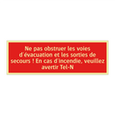 Ne pas obstruer les voies d'évacuation et les sorties de secours ! En cas d'incendie, veuillez avertir Tel-N