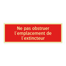 Ne pas obstruer l'emplacement de l'extincteur
