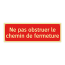 Ne pas obstruer le chemin de fermeture