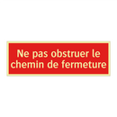 Ne pas obstruer le chemin de fermeture