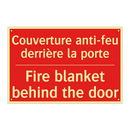 Couverture anti-feu derrière la /.../ - Fire blanket behind the door