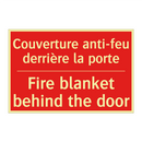 Couverture anti-feu derrière la /.../ - Fire blanket behind the door