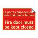 La porte coupe-feu doit être maintenue /.../ - Fire door must be kept closed