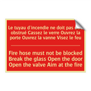 Le tuyau d'incendie ne doit pas /.../ - Fire hose must not be blocked /.../