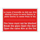 Le tuyau d'incendie ne doit pas /.../ - Fire hose must not be blocked /.../