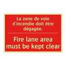 La zone de voie d'incendie doit /.../ - Fire lane area must be kept clear /.../