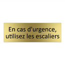 En cas d'urgence, utilisez les escaliers