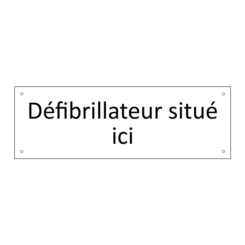 Défibrillateur situé ici
