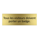 Tous les visiteurs doivent porter un badge.