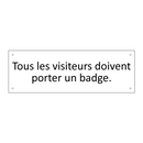 Tous les visiteurs doivent porter un badge.