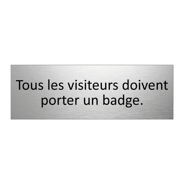 Tous les visiteurs doivent porter un badge.