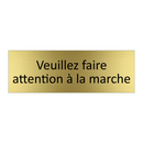 Veuillez faire attention à la marche