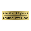 Attention : Sol glissant - Caution: Wet Floor