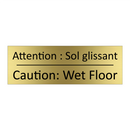 Attention : Sol glissant - Caution: Wet Floor
