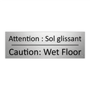 Attention : Sol glissant - Caution: Wet Floor