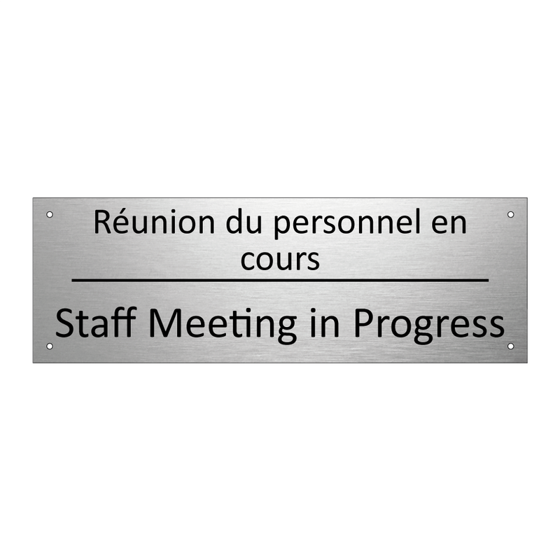 Réunion du personnel en cours - Staff Meeting in Progress