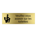 Veuillez vous asseoir sur les toilettes