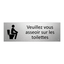 Veuillez vous asseoir sur les toilettes