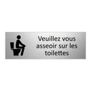 Veuillez vous asseoir sur les toilettes