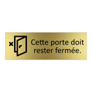 Cette porte doit rester fermée.
