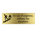 En cas d'urgence, utilisez les escaliers