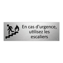 En cas d'urgence, utilisez les escaliers