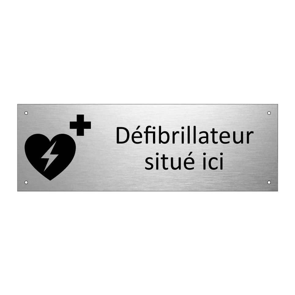 Défibrillateur situé ici