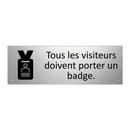 Tous les visiteurs doivent porter un badge.