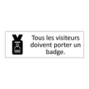 Tous les visiteurs doivent porter un badge.