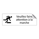 Veuillez faire attention à la marche