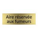 Aire réservée aux fumeurs