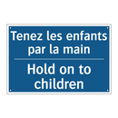 Tenez les enfants par la main - Hold on to children