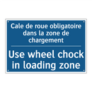 Cale de roue obligatoire dans  /.../ - Use wheel chock in loading zone /.../