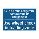 Cale de roue obligatoire dans  /.../ - Use wheel chock in loading zone /.../