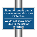 Nous ne serrons pas la main en  /.../ - We do not shake hands due to the  /.../