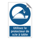 Utilisez le protecteur de scie à table
