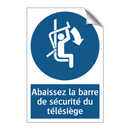 Abaissez la barre de sécurité du télésiège