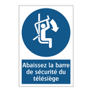 Abaissez la barre de sécurité du télésiège