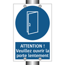 ATTENTION ! Veuillez ouvrir la porte lentement.