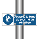 Abaissez la barre de sécurité du télésiège